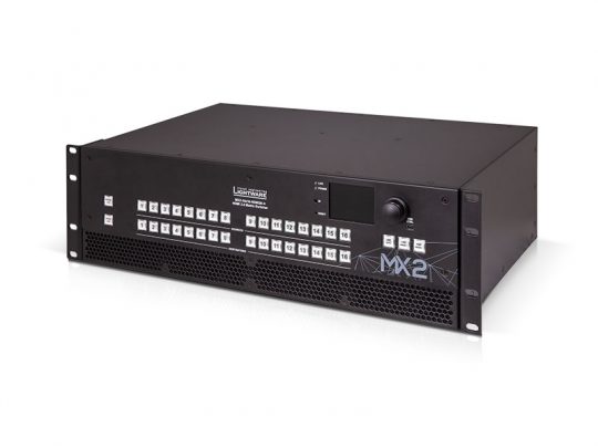 Lightware MX2 matrix switcher—black, rack-mountable device for pro AV systems, features multiple labeled control buttons, a display screen, and a large central control knob on the front panel.