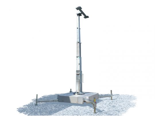 Tall metallic surveillance camera tower called “Mobile Security Tower,” featuring an extended pole with a mounted security camera on top, standing on a sturdy base with four stabilizing legs, isolated against a white background.