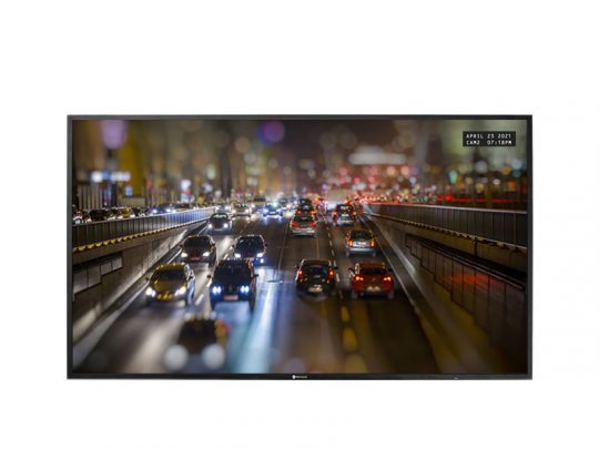 Live traffic camera display screen showing a busy city street at night with multiple cars and blurred headlights; timestamp in the corner reads April 23, 2021, Cam2, 07:18PM. Ideal for showcasing real-time urban traffic monitoring technology.