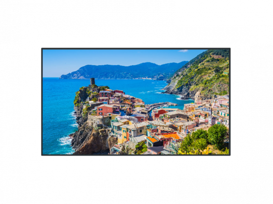 Colorful coastal village perched on rocky cliffs above blue sea—Cinque Terre, Italy. Vibrant hillside houses face the ocean with lush green hills and distant mountains under a sunny, clear sky. Perfect for travel inspiration and Mediterranean landscape lovers.