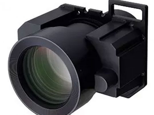 Close-up of a professional black camera lens with a rectangular, industrial-style housing, designed for high-end photographic or optical equipment such as the [insert product name if available]; the robust casing indicates specialized use in studio or technical settings.