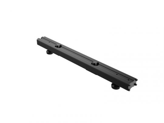 Unilumin Stacking - URMIII 2.6 MK2 Pro foot rent, a black rectangular metal component with a ridged surface and three circular mounting feet, displayed isolated on a white background.