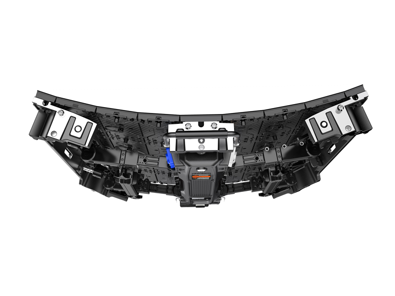 Close-up of the back of a Unilumin URMIII 2.6 MK2 Pro Flex XS LED Wall Module, showing 2.6mm pixel pitch panel with visible connectors, mounting brackets, and central control module on the curved display surface.