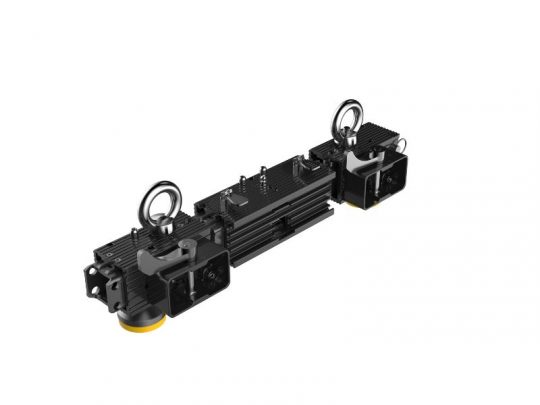 Unilumin Stacking URMIII 2.6 MK2 Pro 2in1 Bracket XS 0.5m – black industrial electronic device with two large metal lifting rings on top, yellow accents, and multiple connectors, shown isolated on a white background; rent options available.
