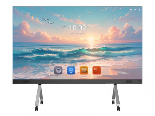 Samsung Flip Pro digital smart display on wheels, showcasing a vibrant ocean sunset with waves, clouds, and birds. The large touchscreen features colorful app icons and a digital clock showing 10:02, ideal for interactive presentations and collaborative workspaces.