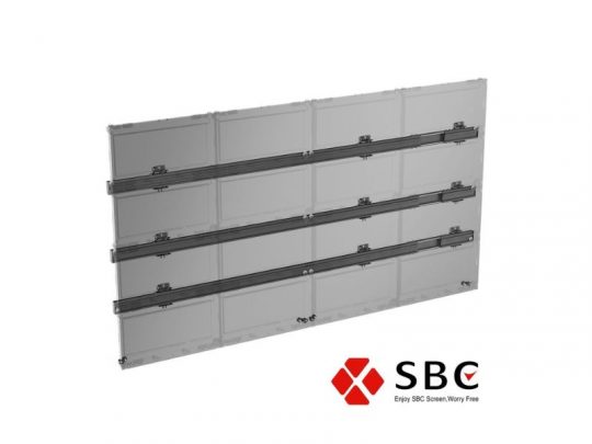 SBC Transparent LED Display Panel with three horizontal support bars, shown at an angle. The bottom right corner features the SBC logo and the slogan Enjoy SBC Screen, Worry Free.