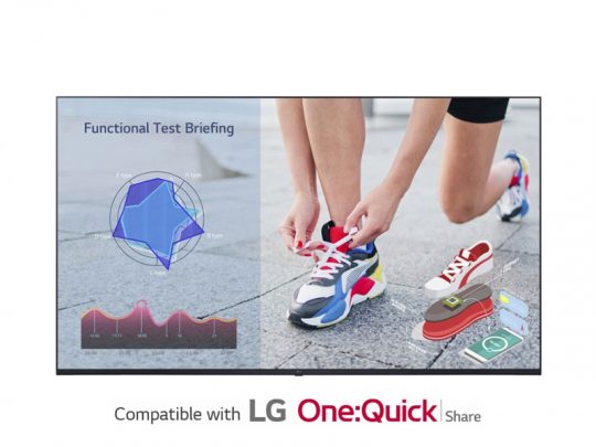 TV screen displaying a “Functional Test Briefing” graph, an image of a person tying their shoe, shoe diagrams, and wearable tech icons. Text at the bottom reads “Compatible with LG One:Quick Share.” Ideal for highlighting LG One:Quick Share’s compatibility with wearable technology and fitness tracking presentations.