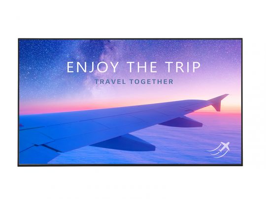 Photo of an airplane wing in-flight at sunrise or sunset, with soft clouds and a vibrant, colorful sky in the background. Overlay text reads “ENJOY THE TRIP” and “TRAVEL TOGETHER.” Ideal for travel inspiration or airline marketing.