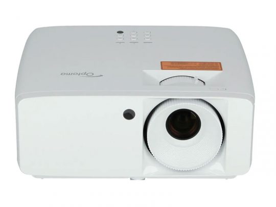 Optoma projector front view—white rectangular device with a large lens on the right, three control buttons on top, and an orange warning label next to the lens.