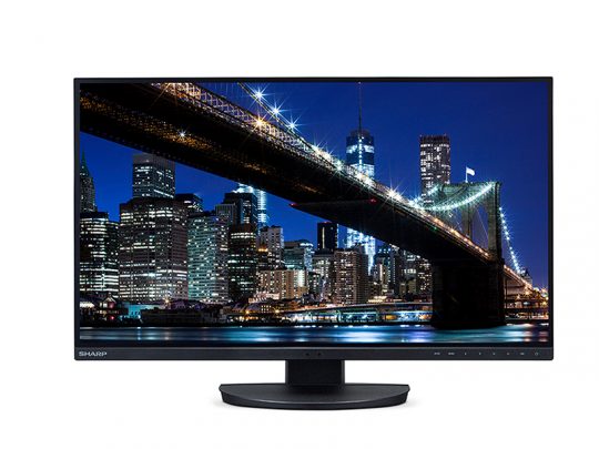 Computer monitor displaying a vibrant nighttime cityscape with a brightly lit suspension bridge and illuminated skyscrapers against a dark sky. Ideal for showcasing the monitor’s high-definition display quality for stunning visuals.