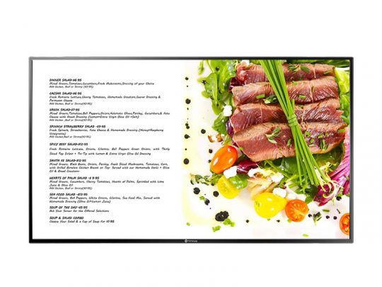 Digital display showing a restaurant menu on the left and a plated dish featuring sliced seared meat, cherry tomatoes, mixed greens, and fresh herbs on the right; food is beautifully arranged with vibrant garnishes.