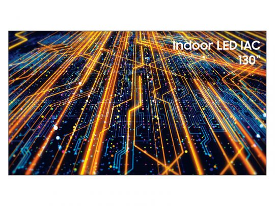 Abstraktes digitales Bild mit leuchtenden orangefarbenen und blauen Schaltkreislinien und Punkten auf dunklem Hintergrund. Oben rechts steht in weißer Schrift "indoor LED IAC 130". Das Motiv symbolisiert moderne LED-Technologie und Innovation.
